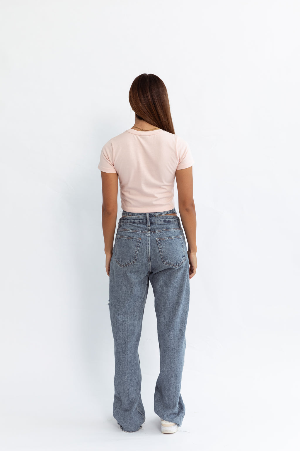 A pink kohz crewneck bb crop t-shirt with embroidery on the chest.