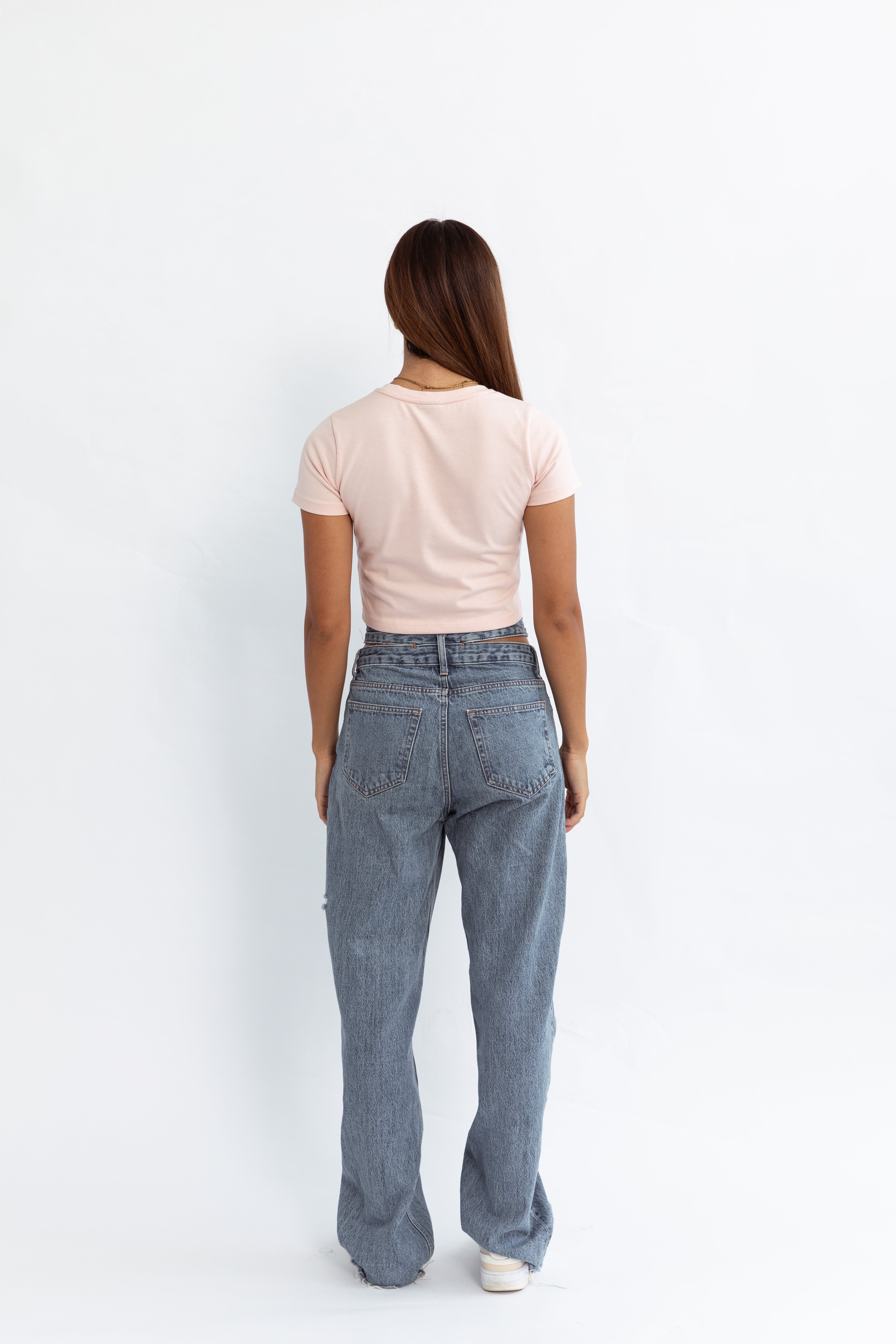 A pink kohz crewneck bb crop t-shirt with embroidery on the chest.