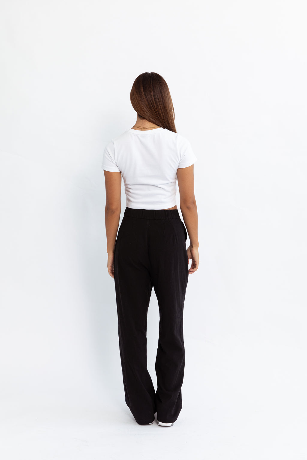 A white kohz crewneck bb crop t-shirt with embroidery on the chest.